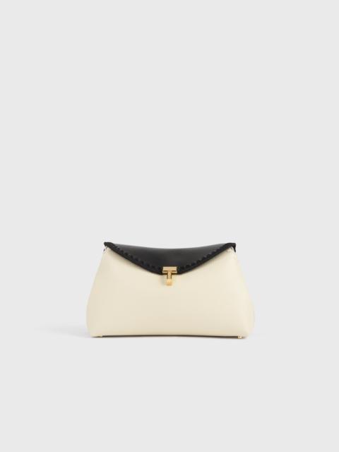 TOTEME T-lock embroidered leather clutch black/milk