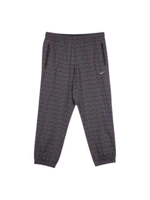Nike Men's Nike Jacquard 로고 본 뭉치 발 길쌈된 우연한 바지/Trousers 어두운 빨강 CJ0804-010