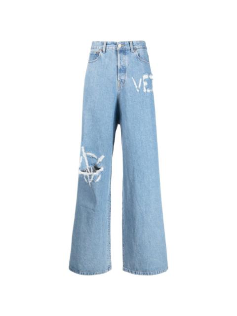 logo-distressed baggy jeans
