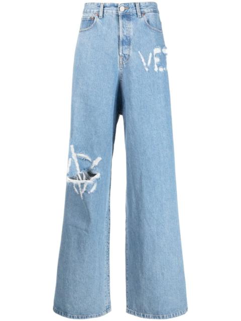 logo-distressed baggy jeans