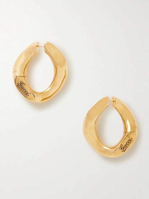 Large gold-tone hoop earrings