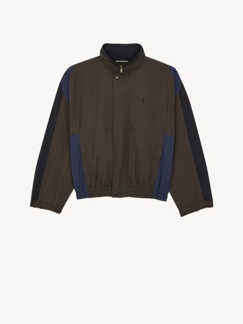 SAINT LAURENT CASSANDRE WINDBREAKER IN NYLON FAILLE