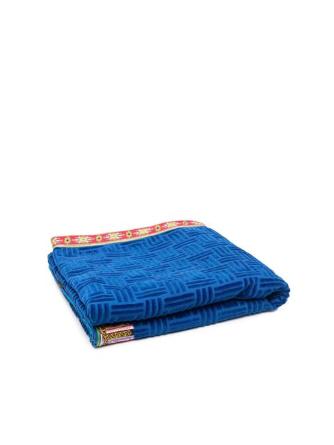 monogram-pattern contrast-trim beach towel