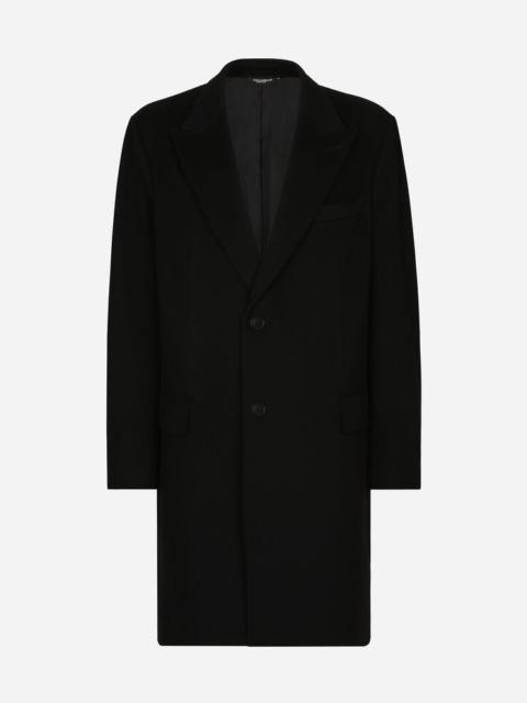 Deconstructed single-breasted wool coat