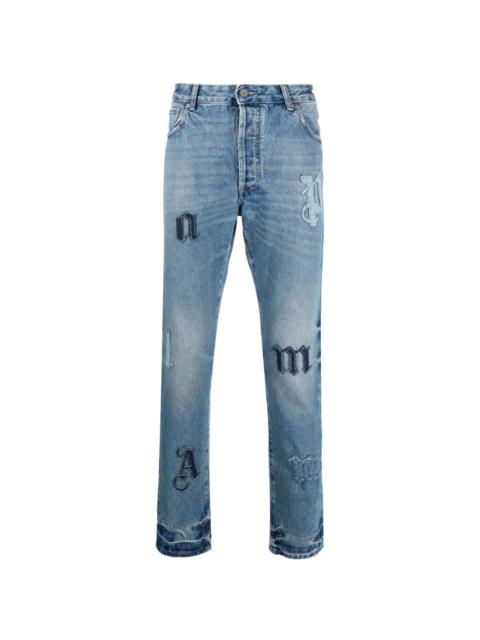 Palm Angels logo-patch straight jeans