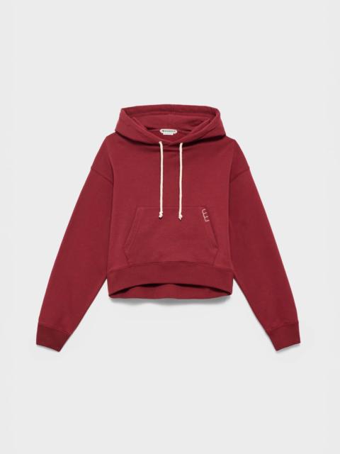 JW Anderson WOMENS CURVED HEM HOODIE IN BURGUNDY