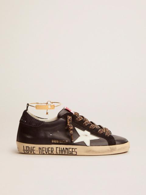 Golden Goose Super-Star sneakers with black upper and gold ankle guard