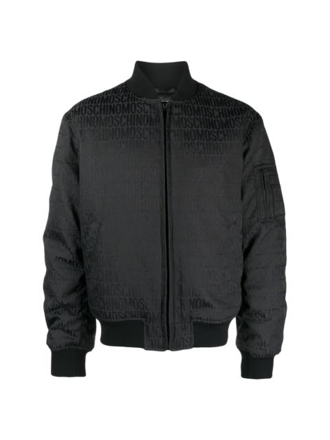 Moschino all-over-logo-print cotton bomber jacket