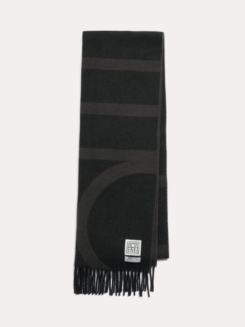 Totême Monogram jacquard wool scarf charcoal mélange