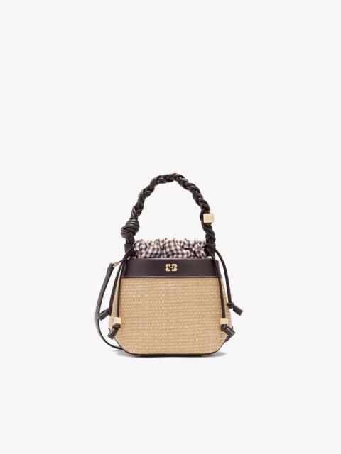 GANNI BOU BUCKET BAG IN STRAW