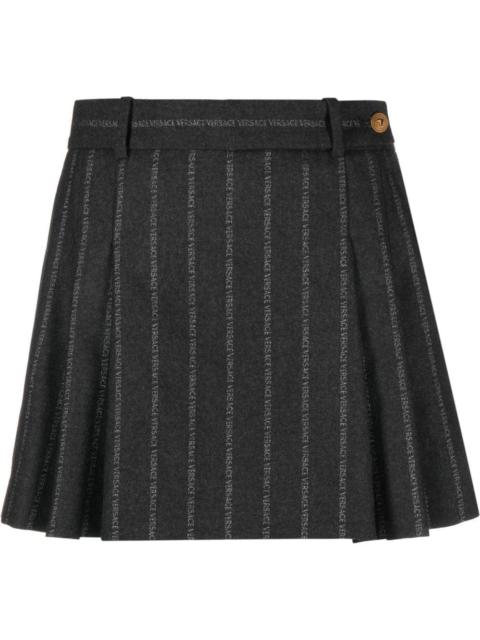 VERSACE logo-print pleated skirt