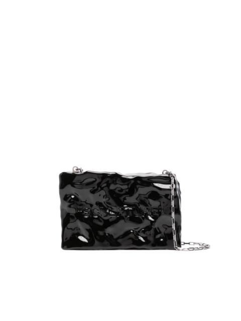 Quote textured clutch bag