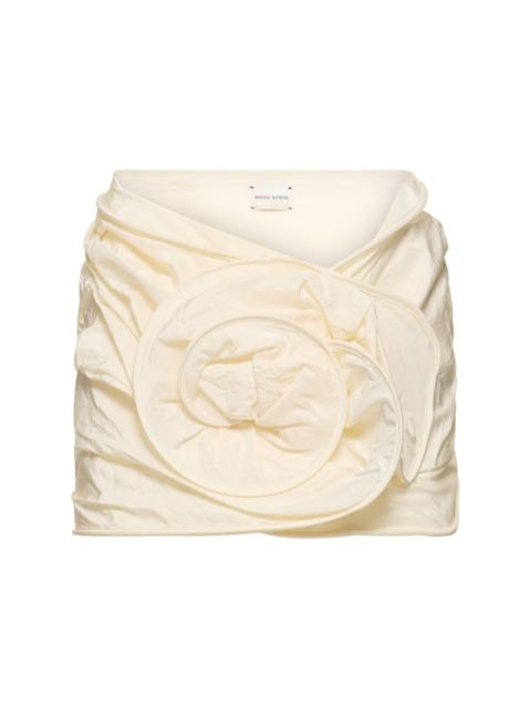 Draped silk mini skirt w/ rose