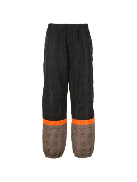 UNDERCOVER colour-block track pants