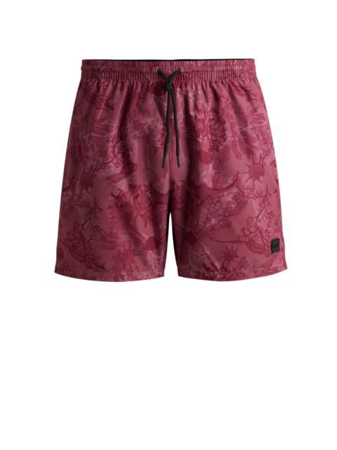 BOSS LOGO-BADGE SWIM SHORTS WITH SEASONAL PRINT