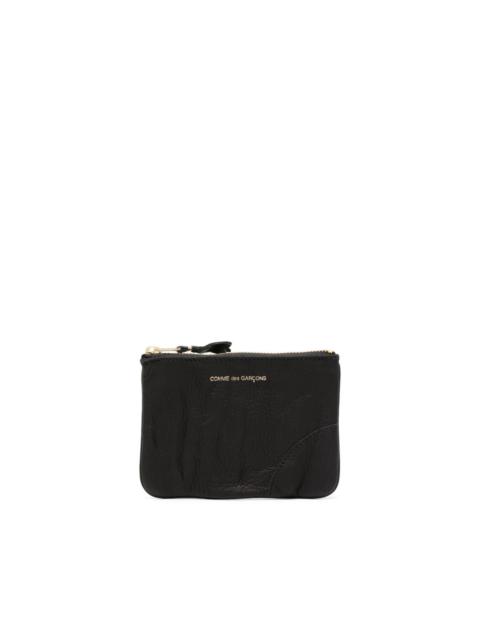 Comme Des Garçons logo-debossed leather wallet