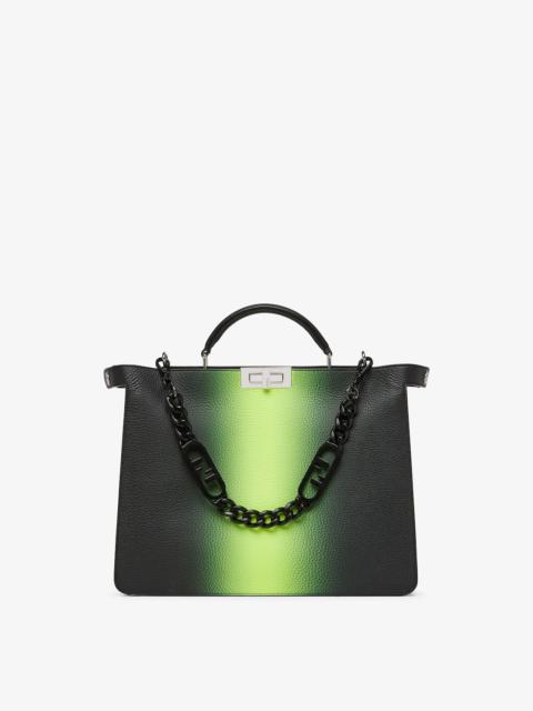 FENDI Medium Peekaboo ISeeU bag made of black Cuoio Romano leather with neon yellow gradient shading. The 