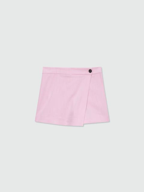 MSGM Pink viscose-blend canvas shorts with wrap closure and visible button