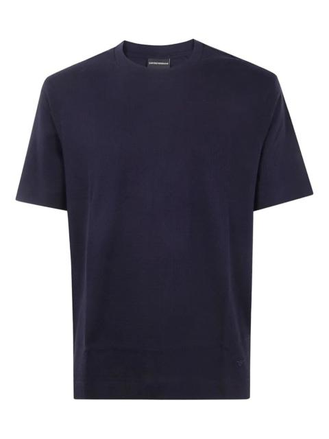 The CLASSIC SHORT SLEEVES T-SHIRT by EMPORIO ARMANI is a must-have in any wardrobe. Crafted from hig