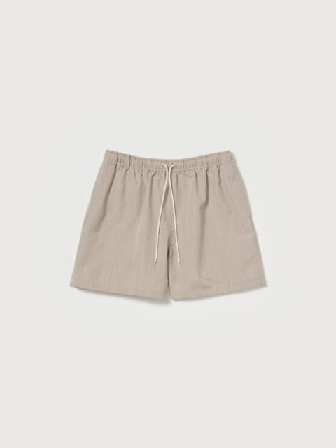 AURALEE WOOL MAX CANVAS SHORTS