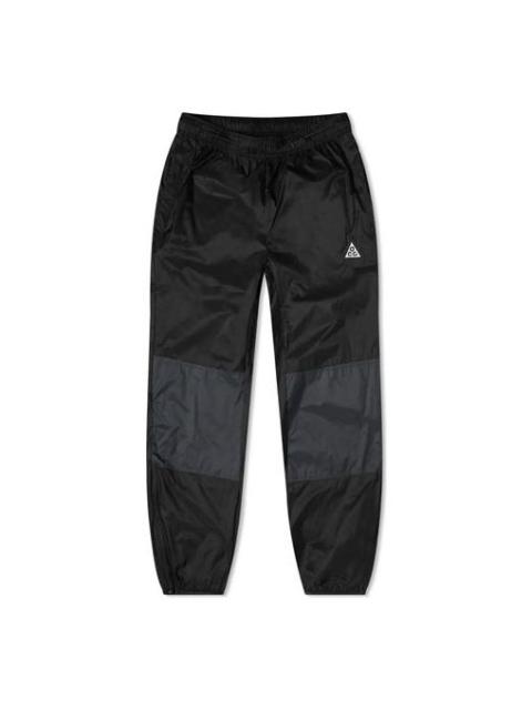 Nike Men's Nike ACG Contrast Color Stitching Zipper Bundle Feet Sports Pants/Trousers/Joggers Black DB113