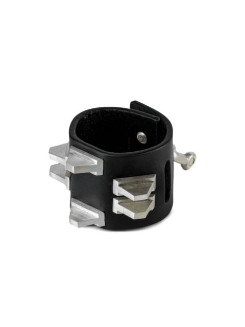 Parts of Four Restraint charm bracelet