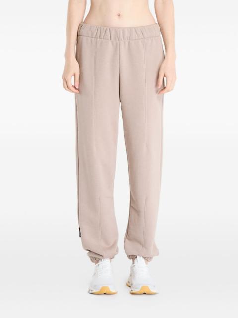 On seam-detail track pants