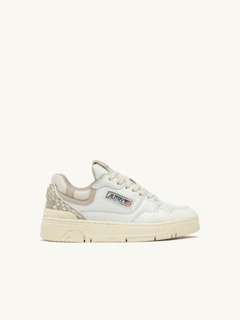 AUTRY CLC LOW SNEAKERS IN WHITE LEATHER WITH SNAKE DIAMOND PRINT