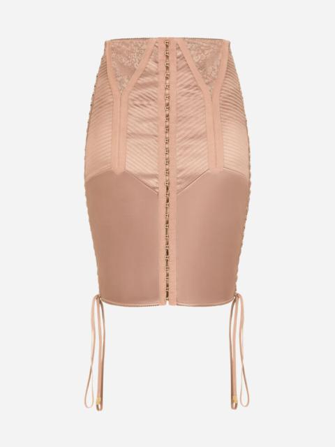 Short satin skirt with laces and eyelets