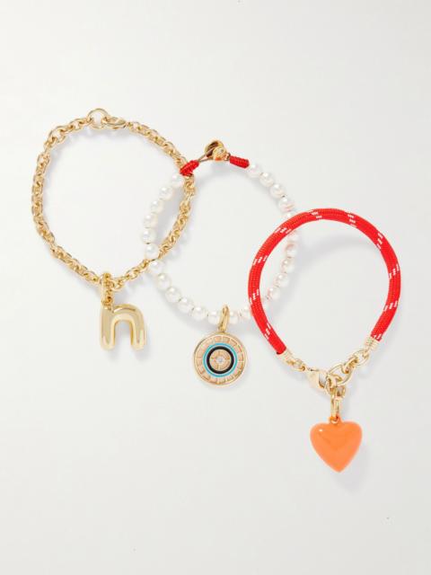 ROXANNE ASSOULIN The Happy Heart Trio set of three gold-tone, cord, faux pearl, crystal and enamel bracelets Red