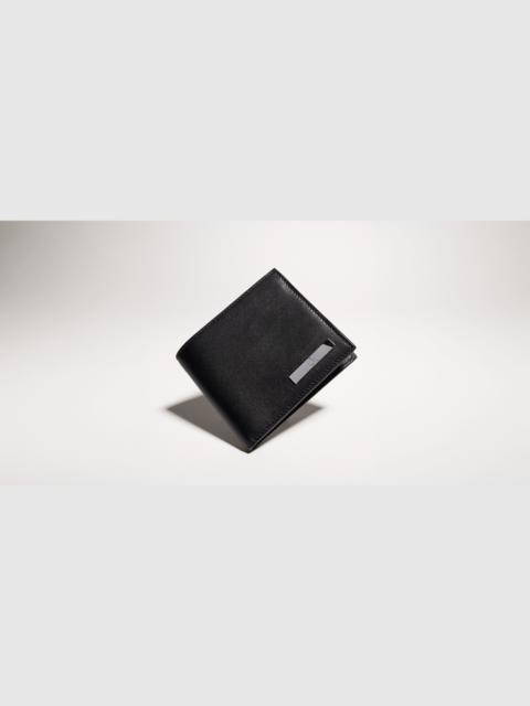 GUCCI Bi-fold wallet with metal tag