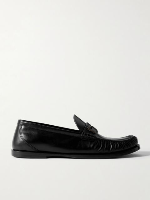 SAINT LAURENT Laurent glossed-leather loafers Black