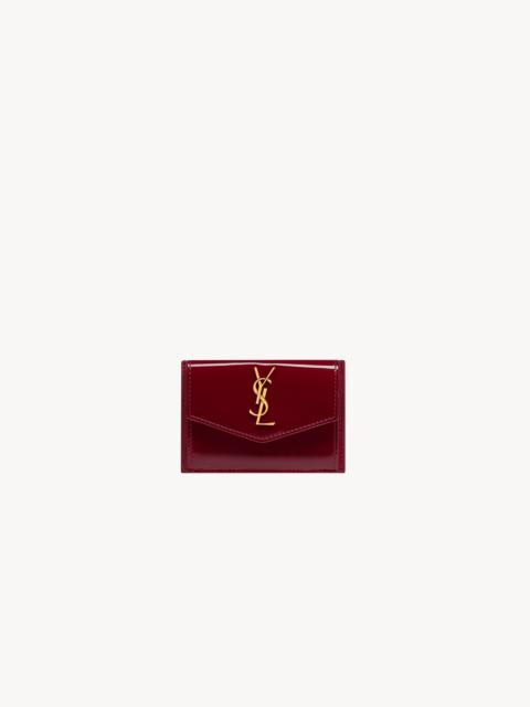 SAINT LAURENT UPTOWN FLAP CARD CASE IN PATENT LEATHER