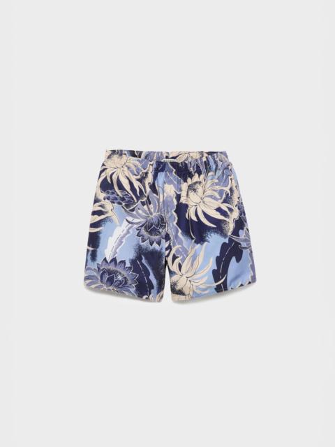 JW Anderson MENS HAWAIIAN PRINT SWIM SHORTS IN SAPPHIRE