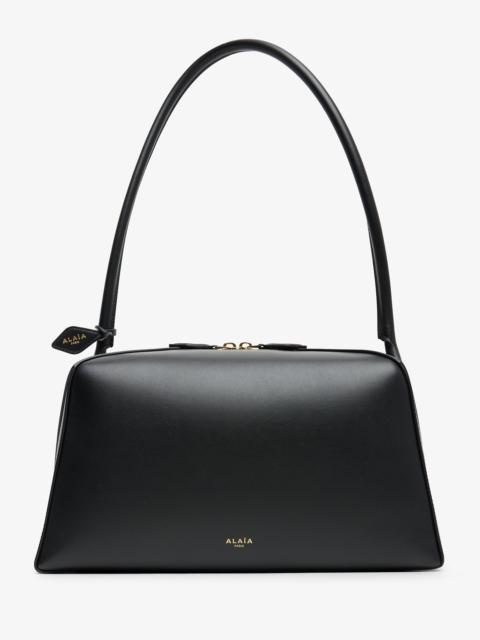 Alaïa Le Bouledogue Medium black leather bag