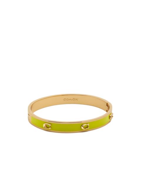 COACH enamelled hinged bracelet