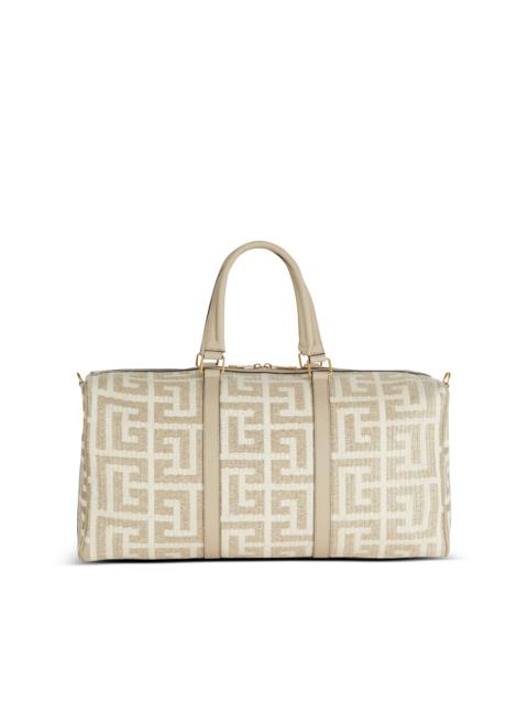 Balmain Monogrammed raffia travel bag