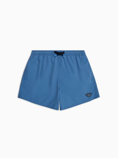 EMPORIO ARMANI Swim trunks with laser-cut eagle patch