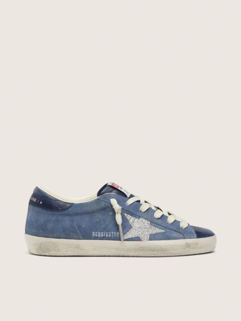 Golden Goose Women’s Super-Star in denim-blue suede with silver glitter star