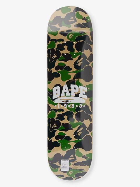 A BATHING APE® Camouflage-pattern branded maple skateboard deck