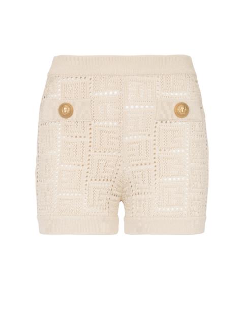 Balmain Monogrammed openwork knit mini shorts
