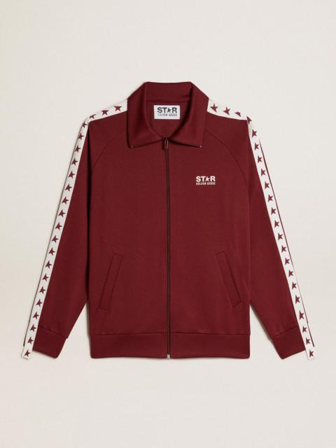 Men’s burgundy zipped sweatshirt with white strip and contrasting stars