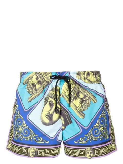 VERSACE Le Maschere-print swim shorts