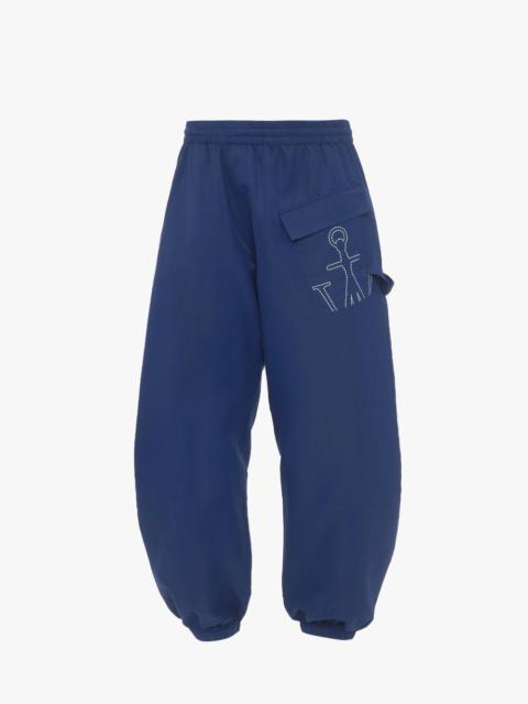 TWISTED JOGGERS WITH ANCHOR LOGO PRINT