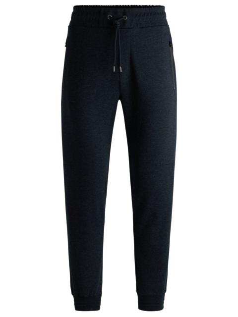 BOSS REGULAR-FIT TRACKSUIT BOTTOMS IN STRETCH FLANNEL