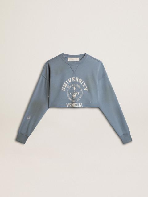 Cropped sweatshirt in baby blue with distressed finish