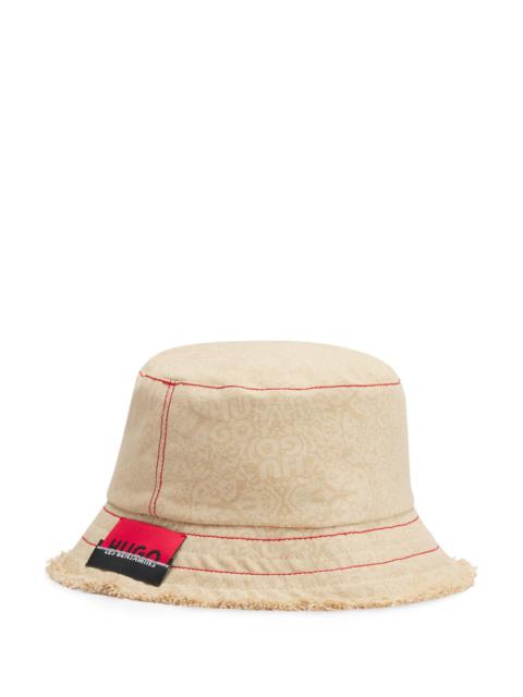 HUGO HUGO X LES BENJAMINS BUCKET HAT WITH CO-BRANDED LABEL