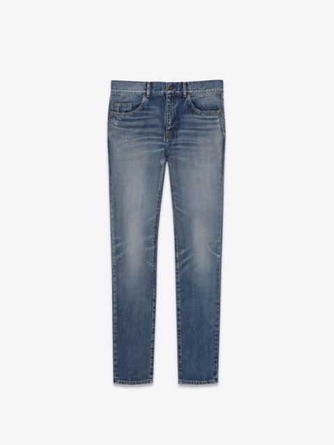 SAINT LAURENT skinny-fit jeans in dirty 90's vintage blue denim