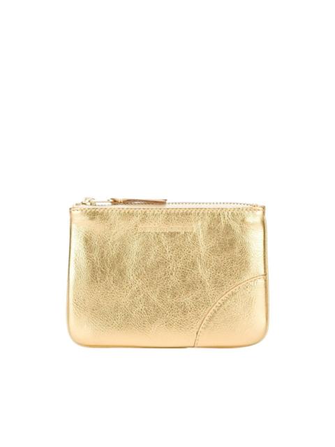 Comme Des Garçons leather wallet