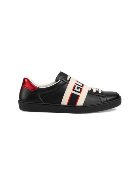 black, red and cream logo stripe leather sneaker